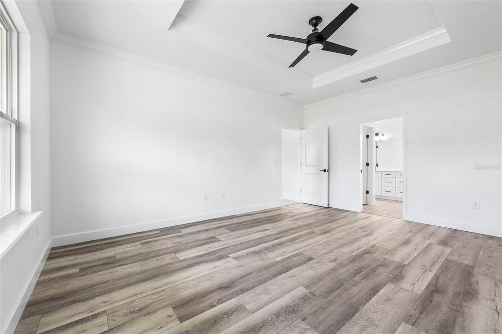 6723 Southwest 15 Place Gainesville, FL 32607 - Photo 17 of 24 a view of empty room with ceiling fan