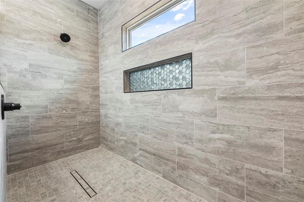 6723 Southwest 15 Place Gainesville, FL 32607 - Photo 19 of 24 a bathroom with a shower