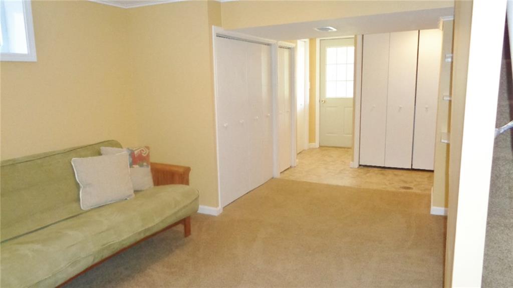 5081 West Harbison Road Pittsburgh, PA 15276 - Photo 12 of 24 LOWER-LEVEL GAME ROOM. FRESHLY PAINTED AND CARPETED.