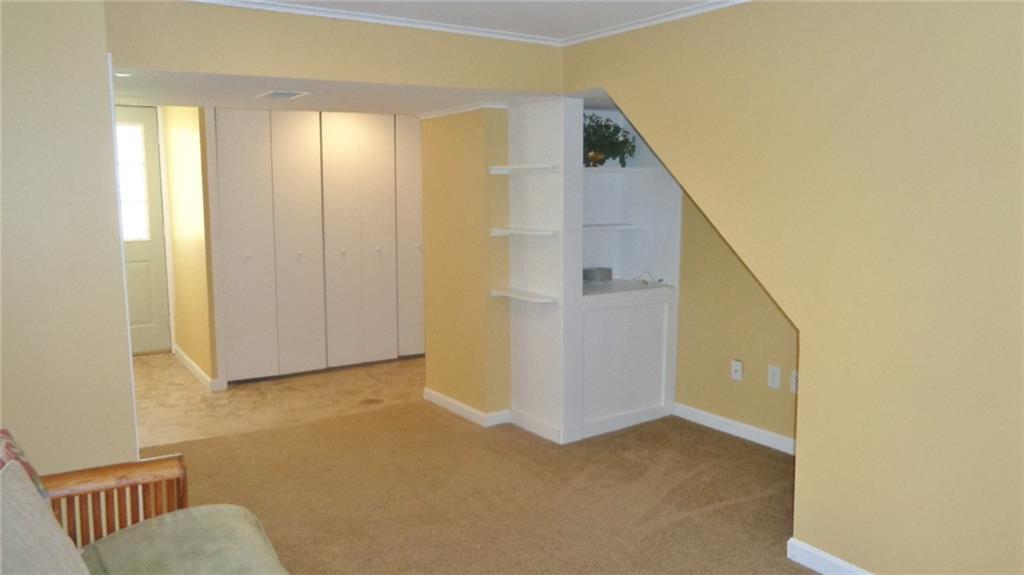 5081 West Harbison Road Pittsburgh, PA 15276 - Photo 13 of 24 GAME ROOM, WITH BUILT-IN SHELVES AND AREA FOR T.V.