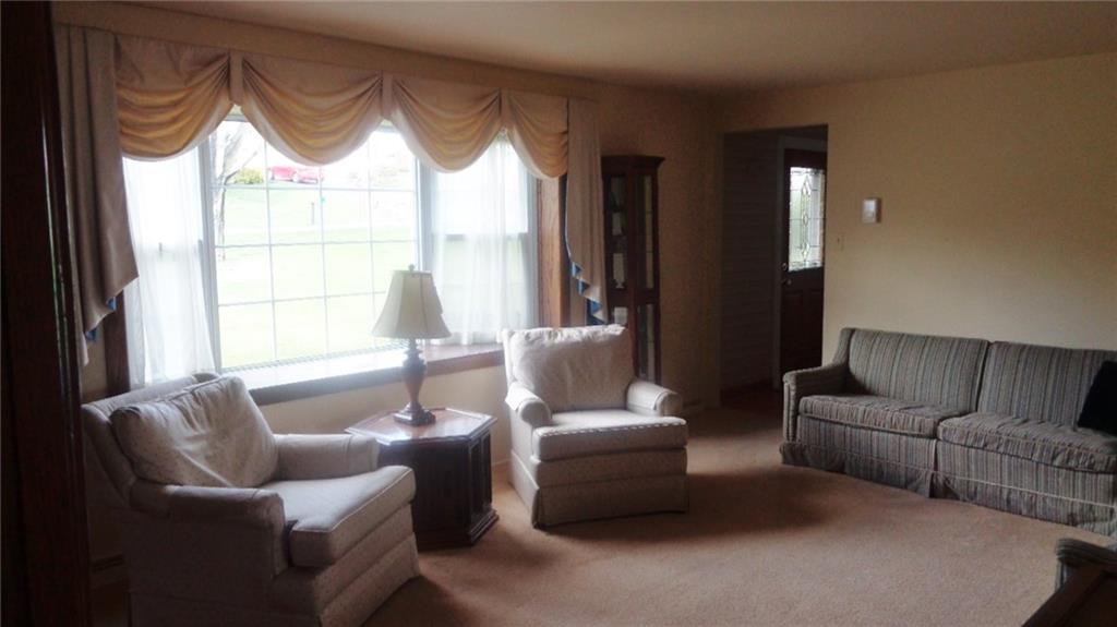 LIVING ROOM, SHOWING LARGE PICTURE WINDOW