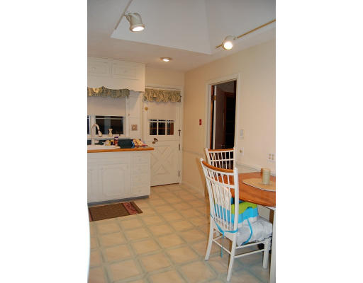67 Robin Road Longmeadow, MA 01106 - Photo 15 of 18 a room with cabinets and view of living room