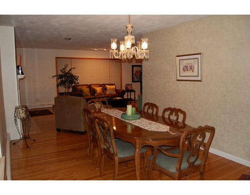 67 Robin Road Longmeadow, MA 01106 - Photo 8 of 18 a view of a dining room with furniture and chandelier