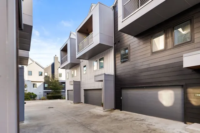 a view of a street with buildings