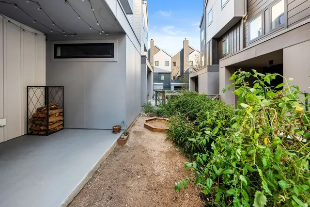 a view of a livingroom with furniture and a window