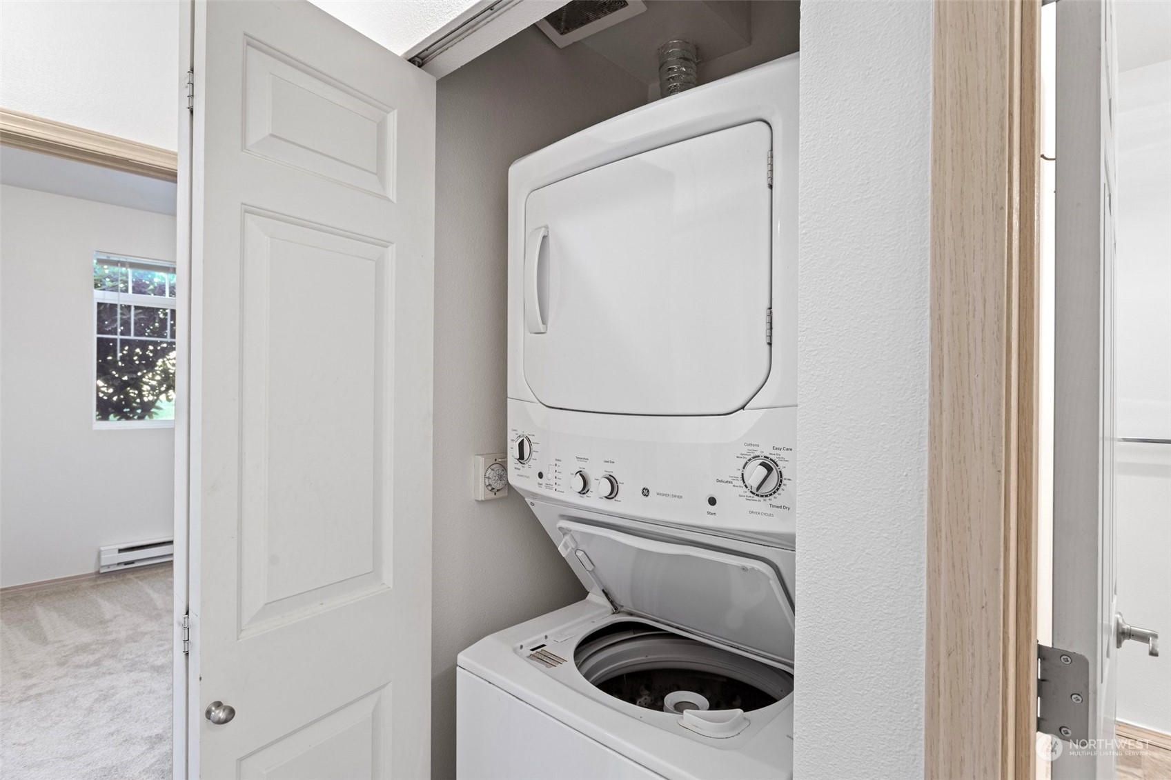 18930 Bothell Everett Highway, Unit V104 Bothell, WA 98012 - Photo 19 of 21 a utility room with dryer and washer