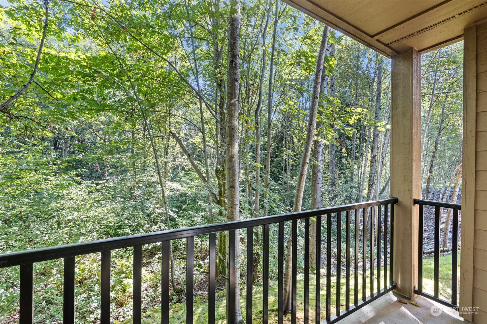 18930 Bothell Everett Highway, Unit V104 Bothell, WA 98012 - Photo 20 of 21 a view of a balcony with outdoor space