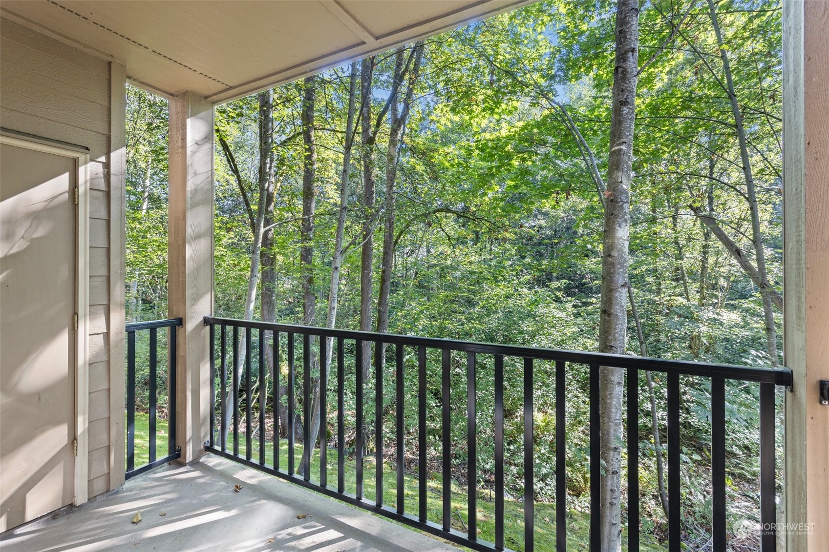 18930 Bothell Everett Highway, Unit V104 Bothell, WA 98012 - Photo 21 of 21 a view of a balcony with outdoor space