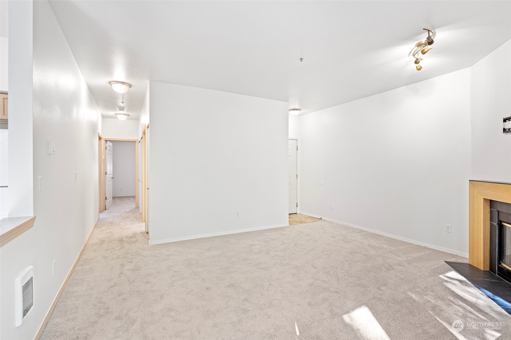 18930 Bothell Everett Highway, Unit V104 Bothell, WA 98012 - Photo 5 of 21 a view of an empty room