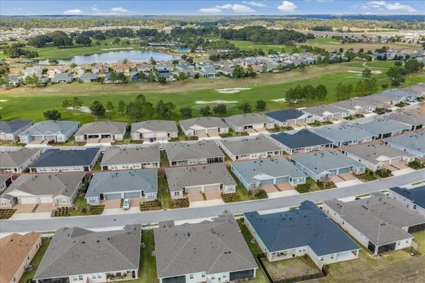 a view of a lake with a yard