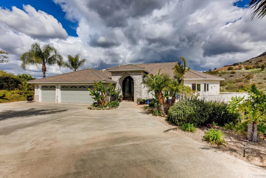 1375 Las Vistas Road Fallbrook, CA 92028 - Photo 1 of 1 a front view of a house with garden