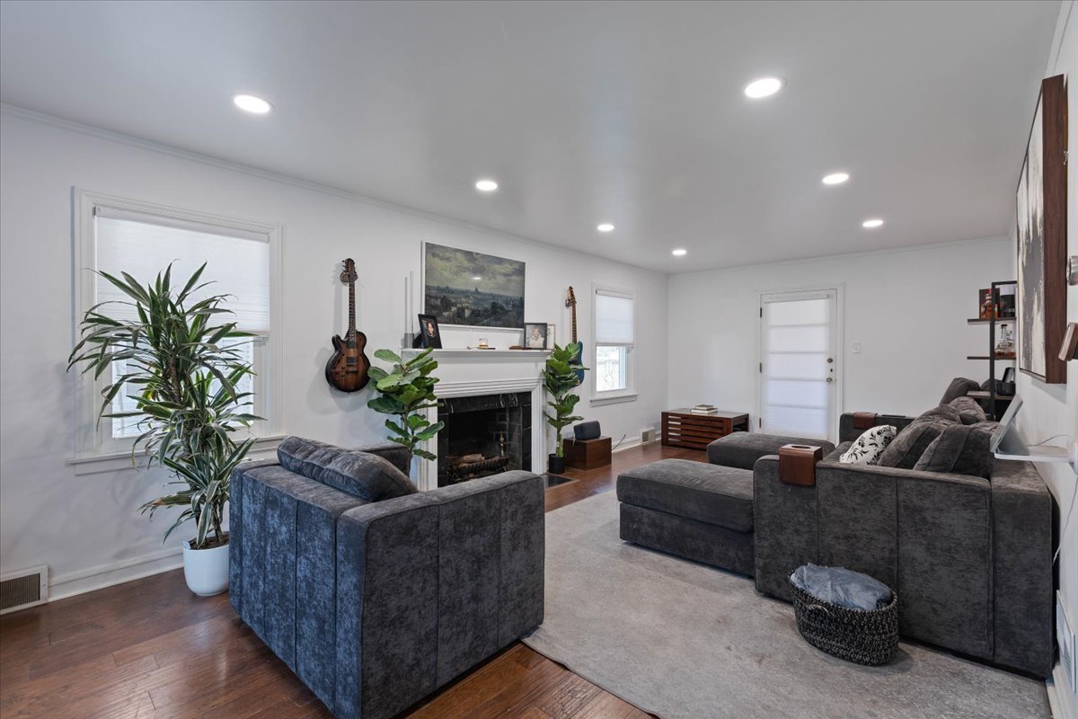 9527 South Damen Avenue Chicago, IL 60643 - Photo 11 of 33 a living room with furniture a fireplace a potted plant and a fireplace