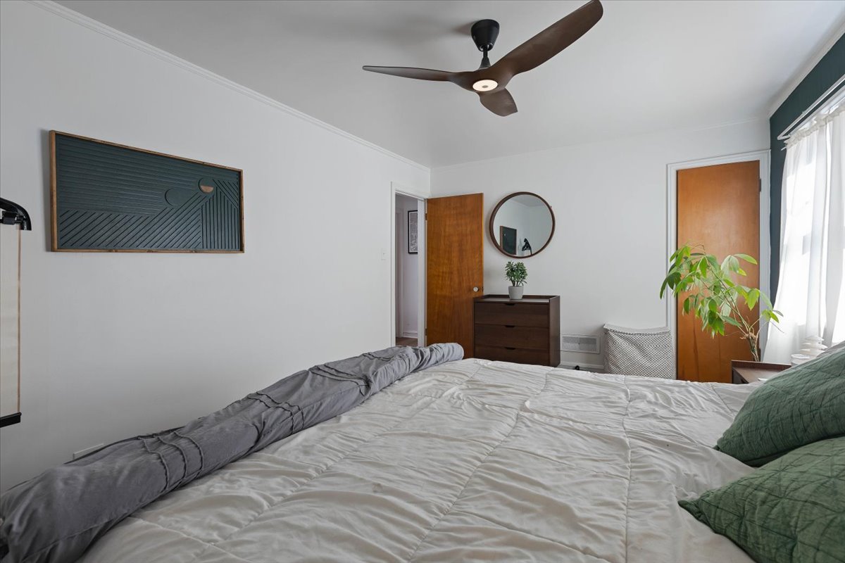 9527 South Damen Avenue Chicago, IL 60643 - Photo 14 of 33 a bedroom with a bed and a large mirror