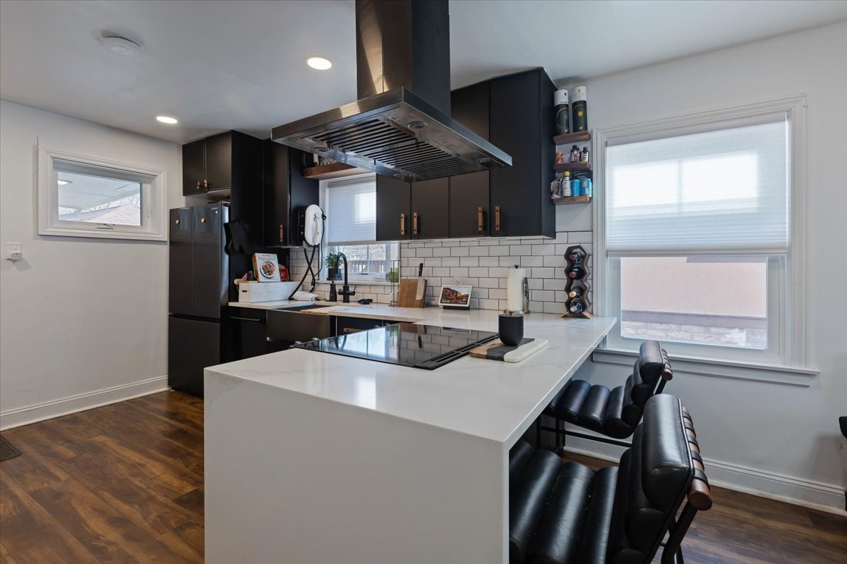 9527 South Damen Avenue Chicago, IL 60643 - Photo 2 of 33 a kitchen with kitchen island a stove a sink and a refrigerator