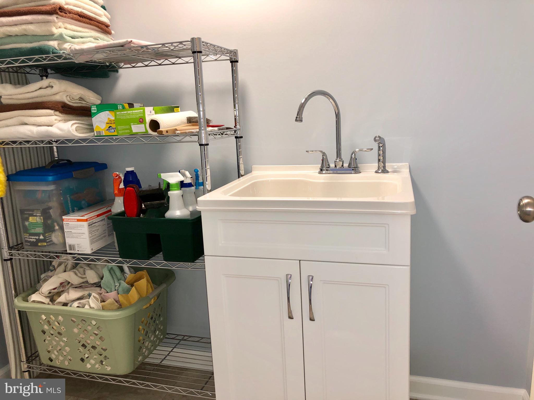 290 Alexis Drive Ranson, WV 25438 - Photo 24 of 33 basement -craft room with sink