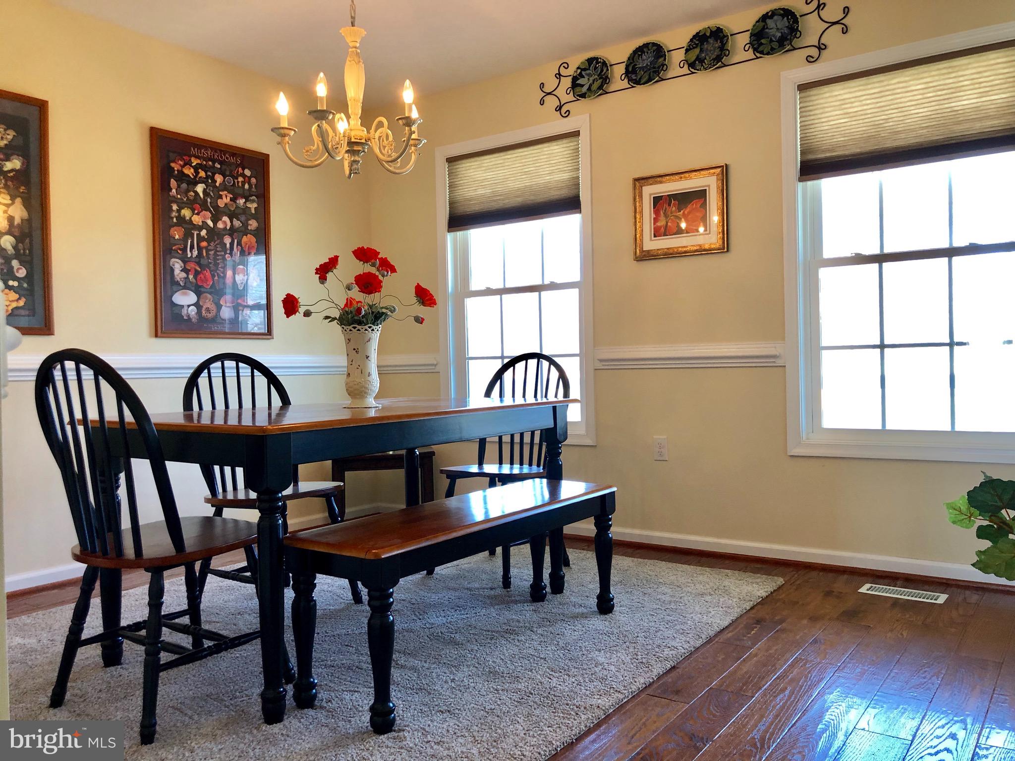 290 Alexis Drive Ranson, WV 25438 - Photo 6 of 33 dining room with wood floors