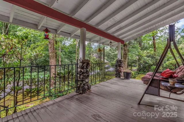 a view of a patio with wooden floor