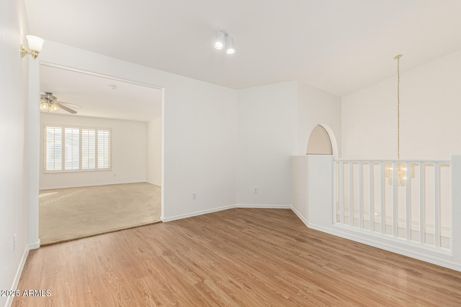 2978 East Ranch Court Gilbert, AZ 85296 - Photo 20 of 72 a view of empty room with wooden floor