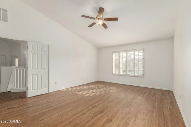 a kitchen with stainless steel appliances granite countertop a sink counter space cabinets and a window