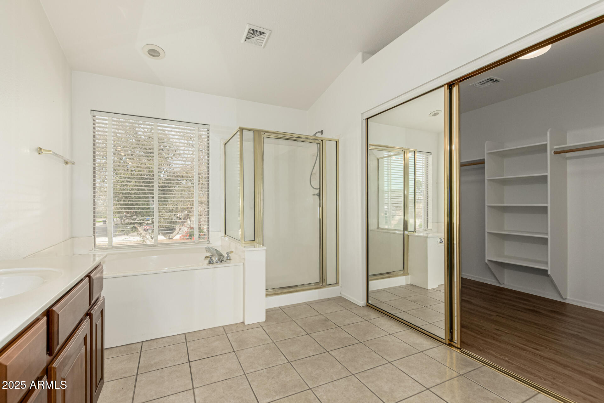 2978 East Ranch Court Gilbert, AZ 85296 - Photo 30 of 72 a bathroom with a tub shower and sink