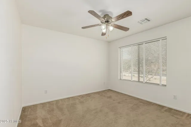 a view of a hallway with windows