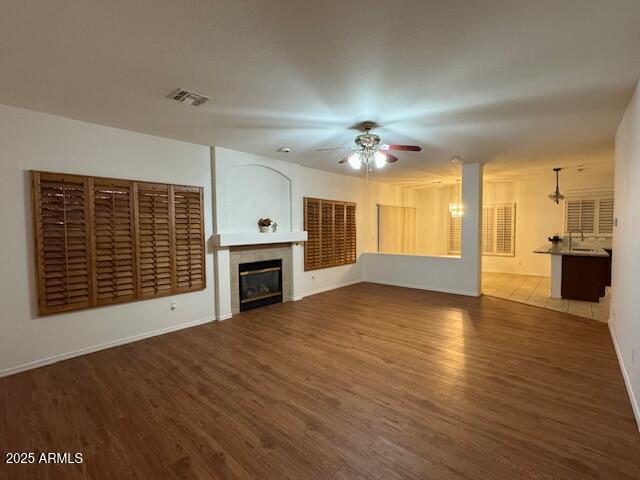 2978 East Ranch Court Gilbert, AZ 85296 - Photo 60 of 72 a view of an empty room with a kitchen and fireplace