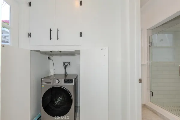a kitchen with a sink stove and refrigerator