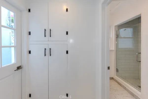 a bathroom with a sink a vanity and a mirror