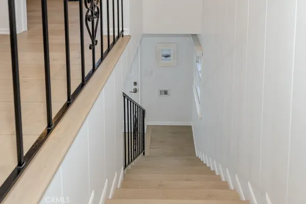 a view of a hallway with closet and entryway