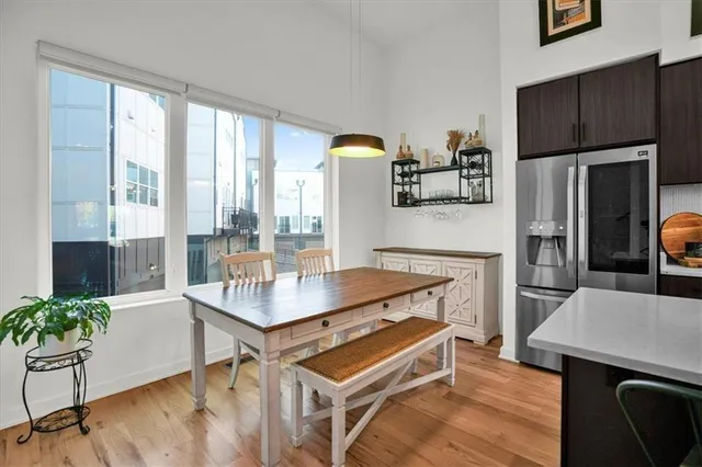 a bathroom with a toilet sink and shower