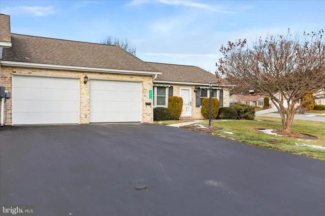 a view of a house with a street