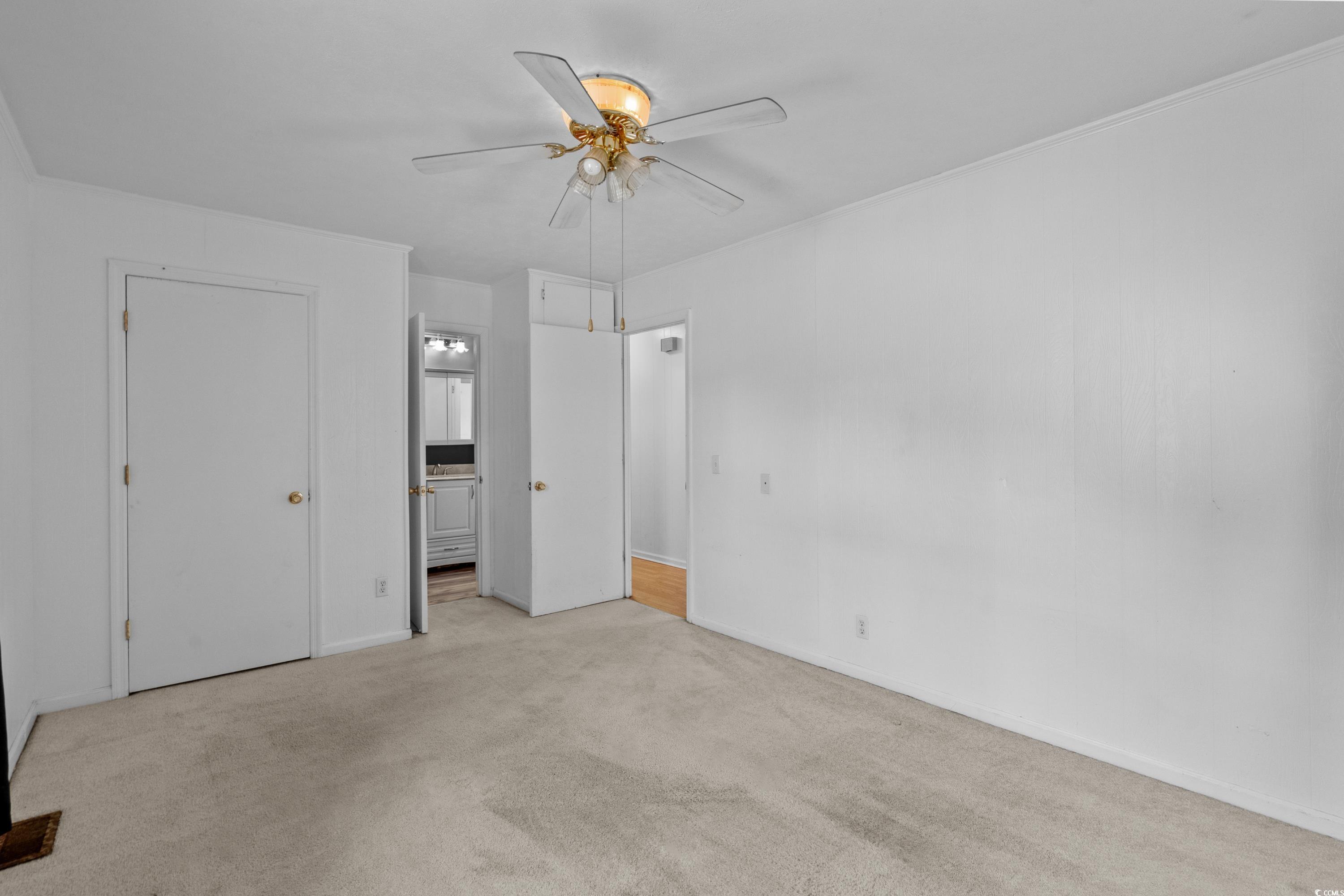140 Flag Patch Road Loris, SC 29569 - Photo 26 of 38 Unfurnished bedroom featuring light carpet, ensuit