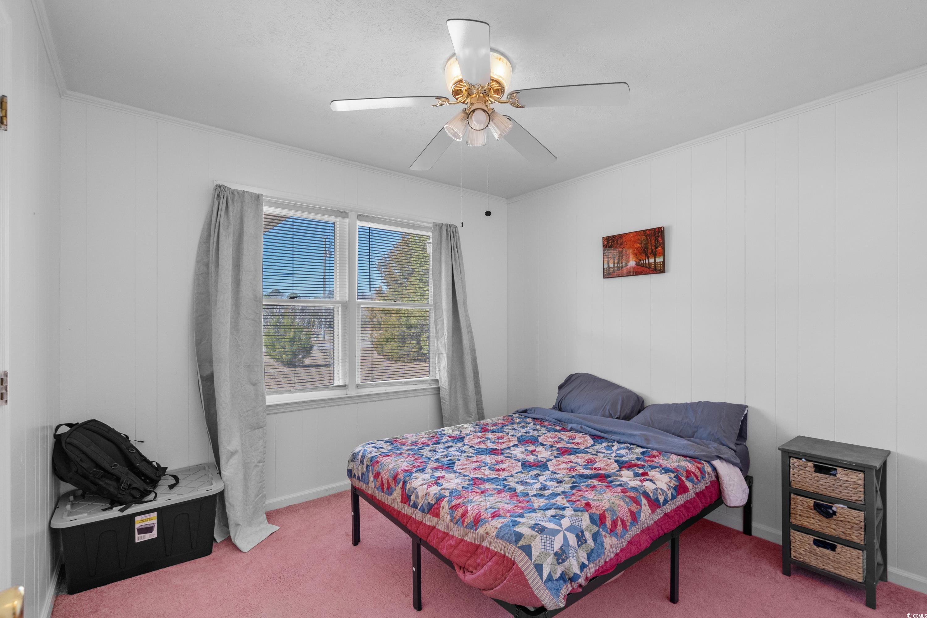 140 Flag Patch Road Loris, SC 29569 - Photo 28 of 38 Carpeted bedroom featuring ceiling fan