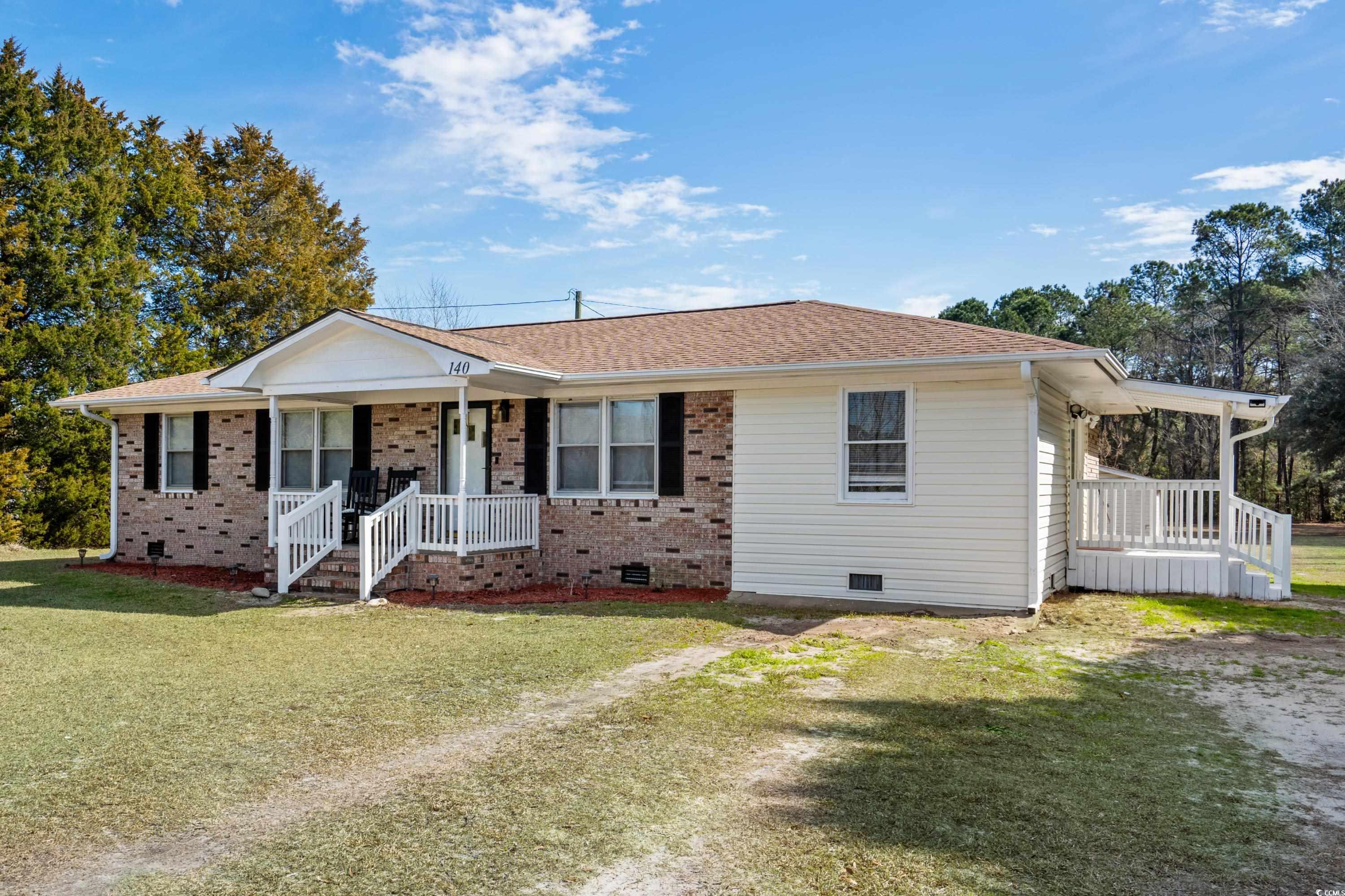 140 Flag Patch Road Loris, SC 29569 - Photo 31 of 38 Single story home with a porch, a front yard, craw