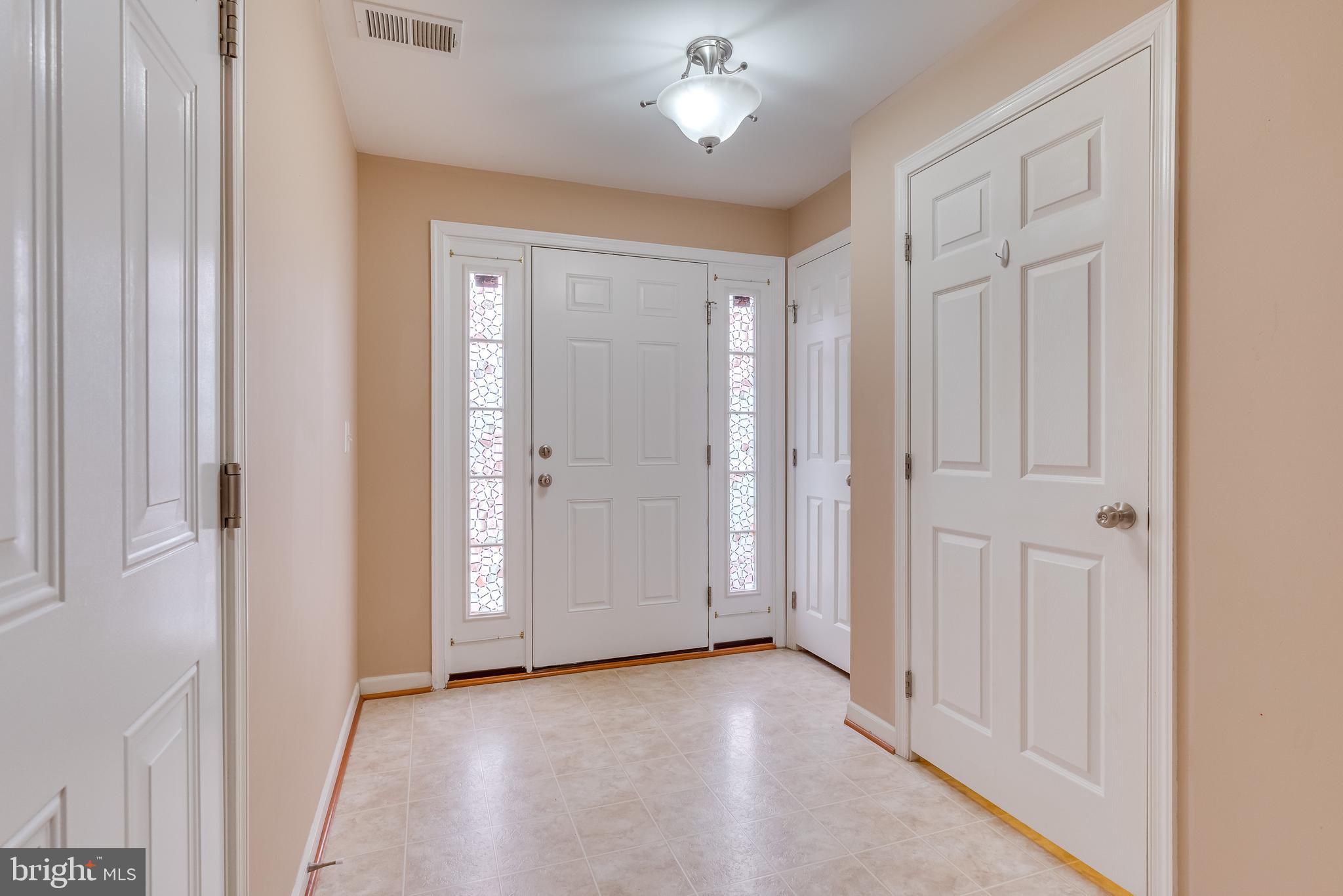 1253 Mare Street Ranson, WV 25438 - Photo 11 of 64 Features coat closet, garage access, + powder room