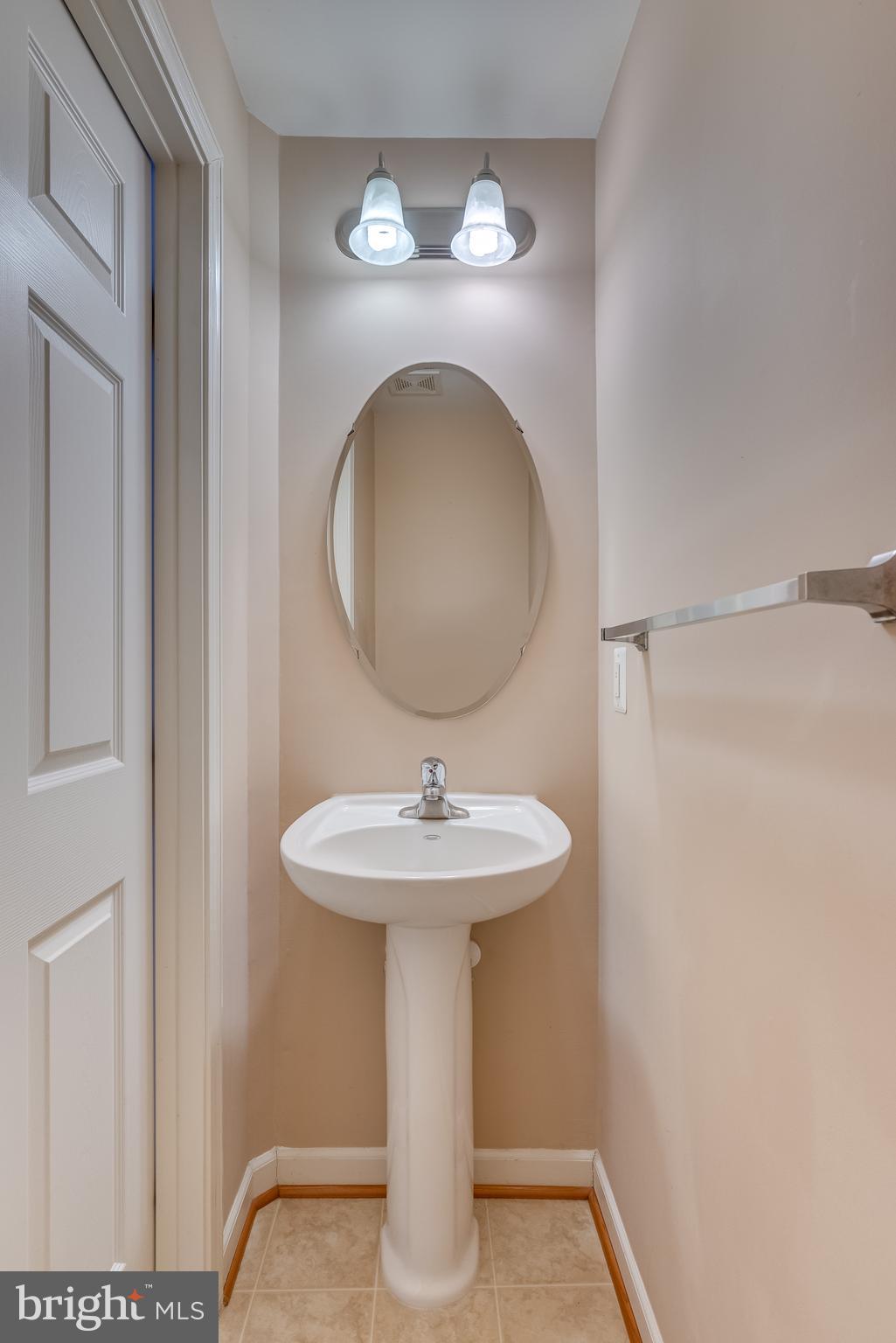 1253 Mare Street Ranson, WV 25438 - Photo 14 of 64 Powder room features elegant pedestal sink