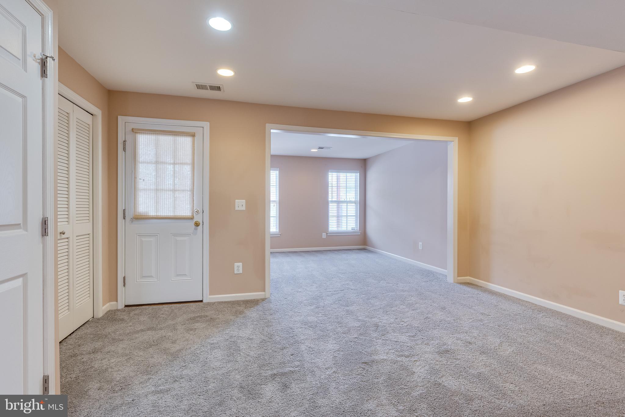 1253 Mare Street Ranson, WV 25438 - Photo 15 of 64 Beyond the foyer is your large finished basement