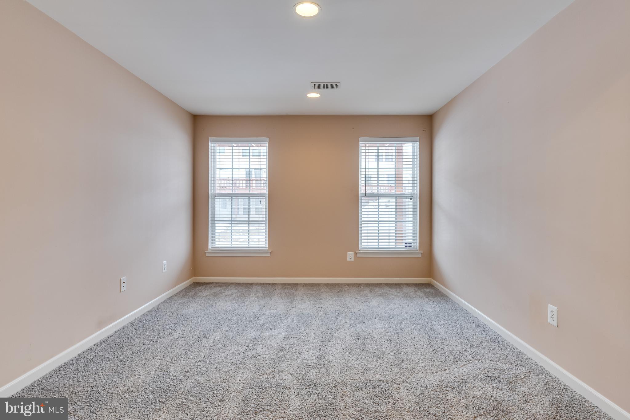 1253 Mare Street Ranson, WV 25438 - Photo 19 of 64 Carpeted w/ recessed lighting and bright windows
