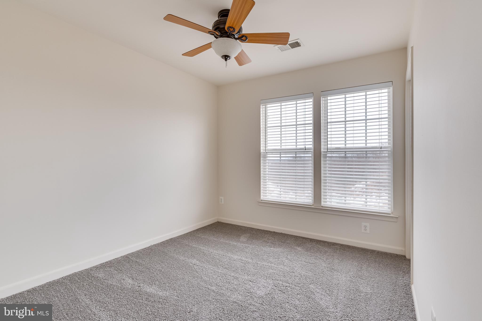1253 Mare Street Ranson, WV 25438 - Photo 38 of 64 Bedroom 1 features large windows and ceiling fan