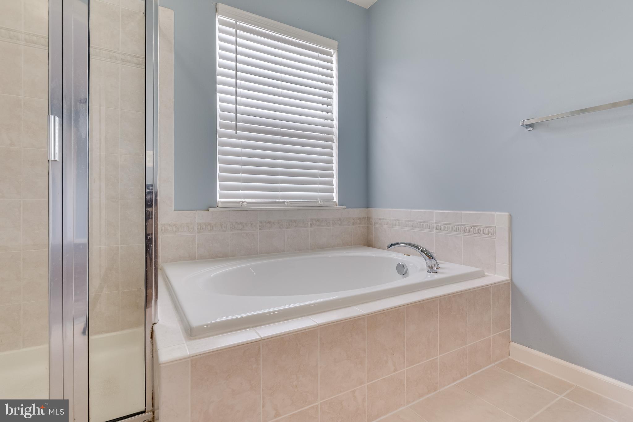 1253 Mare Street Ranson, WV 25438 - Photo 52 of 64 Soaking tub includes ceramic tile surround