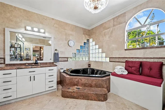a bathroom with a sink toilet and a mirror