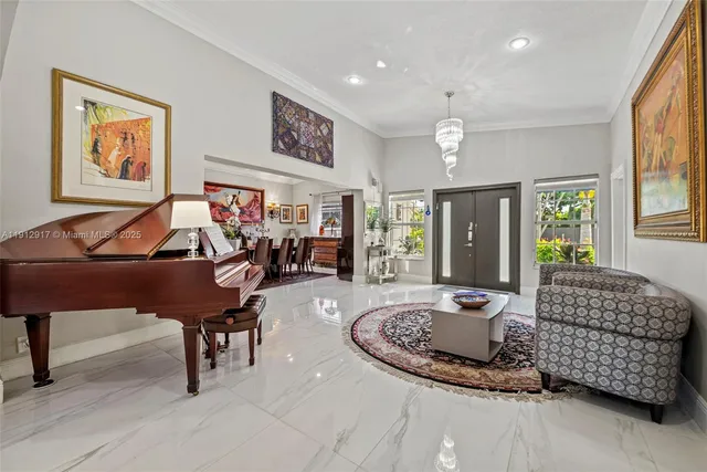 a living room with furniture and a piano