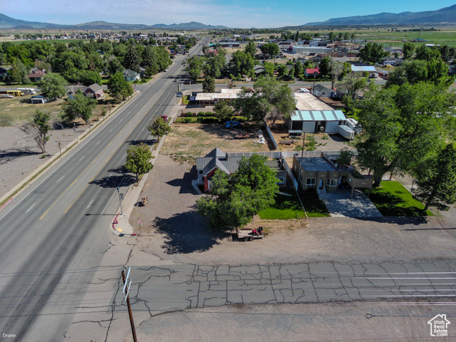 410 North Main Street Beaver, UT 84713 - Photo 26 of 31 Aerial view of residential area featuring a mountainous background