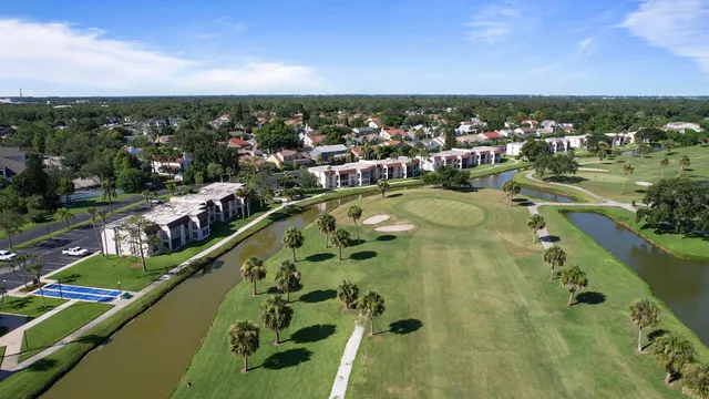 a view of a swimming pool with a lake view