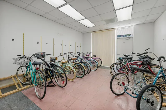a view of a livingroom with furniture and a window
