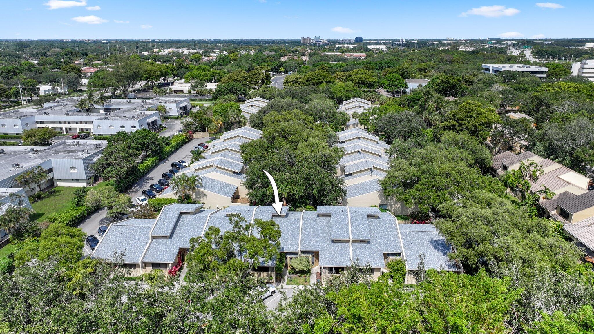 1400 Northwest 9th Avenue, Unit E34 Boca Raton, FL 33486 - Photo 42 of 46 an aerial view of a house with a yard