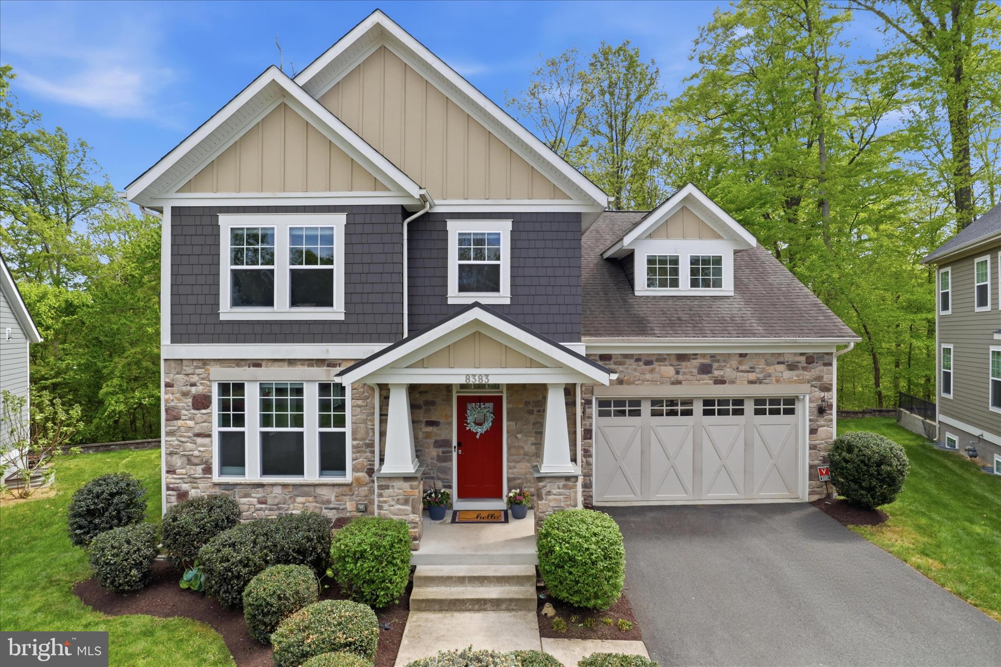 8383 Edward Carr Court Springfield, VA 22153 - Photo 1 of 57 a front view of a house with garden