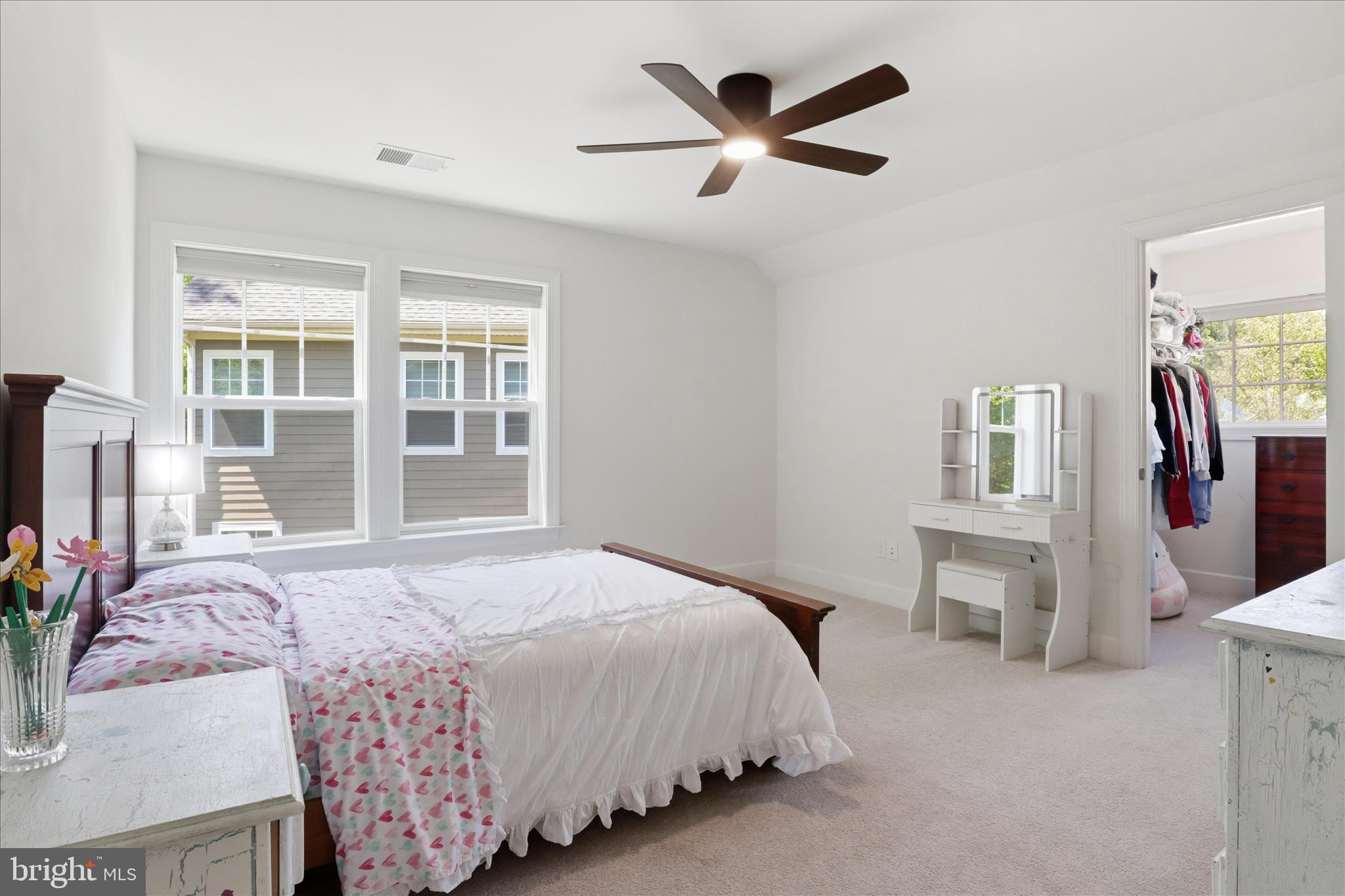 8383 Edward Carr Court Springfield, VA 22153 - Photo 30 of 57 a bedroom with a large bed and a window