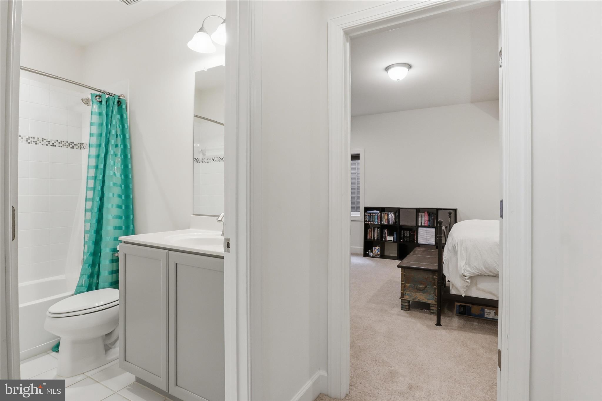 8383 Edward Carr Court Springfield, VA 22153 - Photo 36 of 57 a bathroom with a toilet