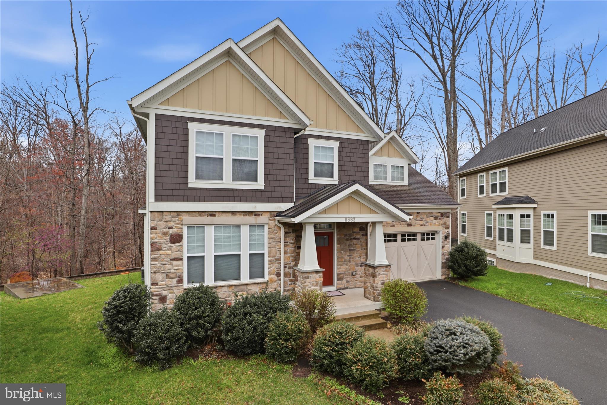 8383 Edward Carr Court Springfield, VA 22153 - Photo 45 of 57 a front view of a house with a yard